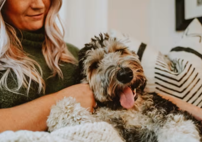 woman-snuggling-with-her-dog